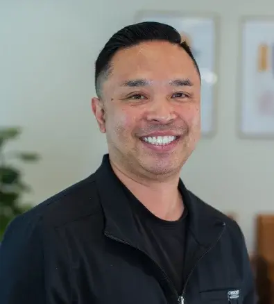Mike, a smiling dental professional at Peoria dental practice.